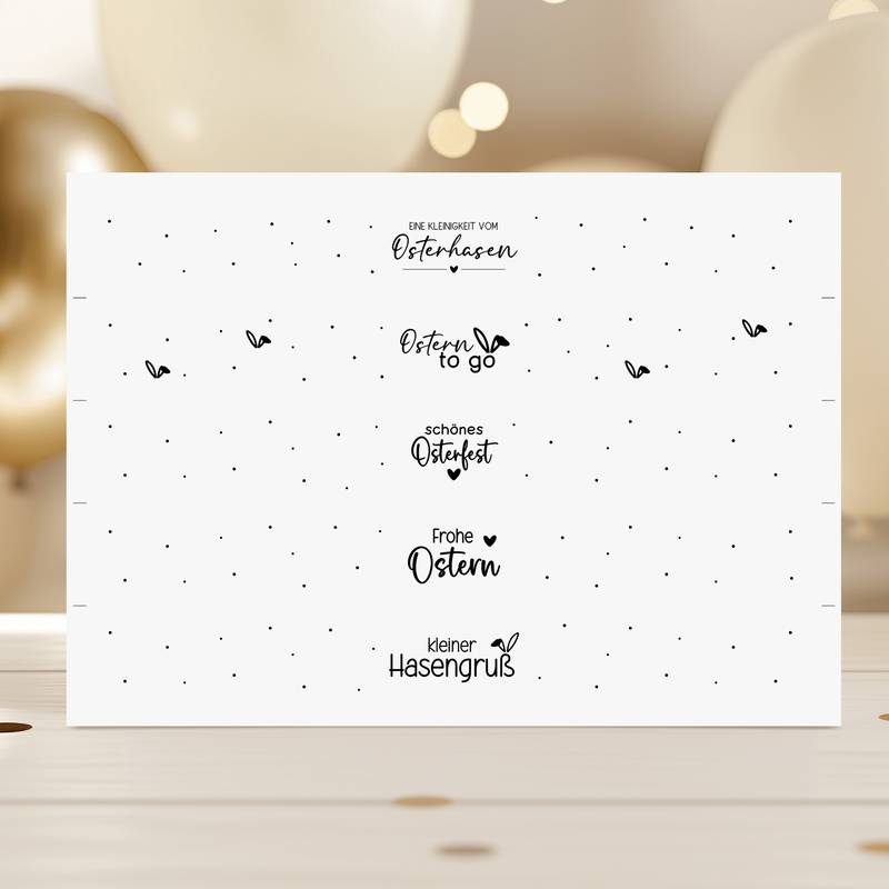 Digitale Vorlage für Oster-Banderolen mit Sprüchen wie Ostern to go und Herz-Dekoration auf weißem Hintergrund.